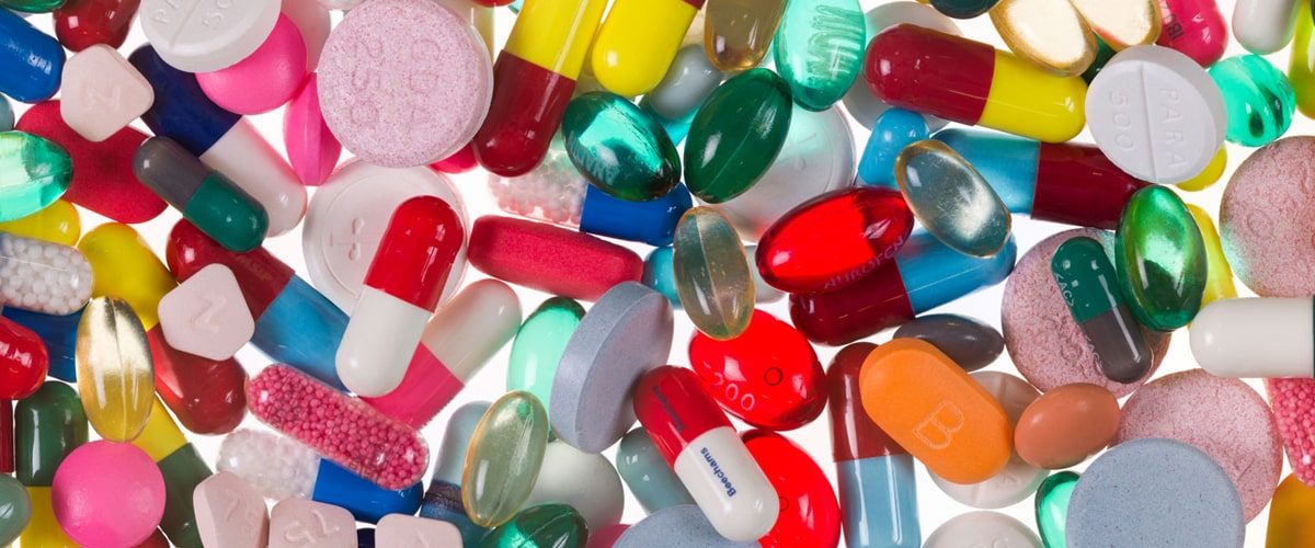 Drug pills up close - wide image