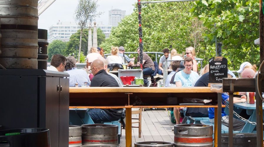 Tamesis Dock bar on a boat on the Thames outside seating in the Summer
